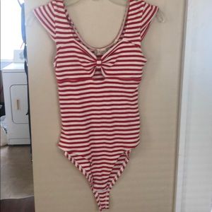 Red and white stripped body suit